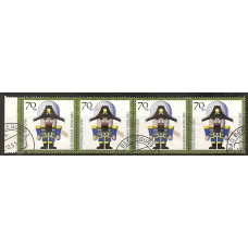 East Germany DDR 1990 sg 2335 - 70pf.+30pf. - Soldier nutcrackers strip of 4 Used Condition